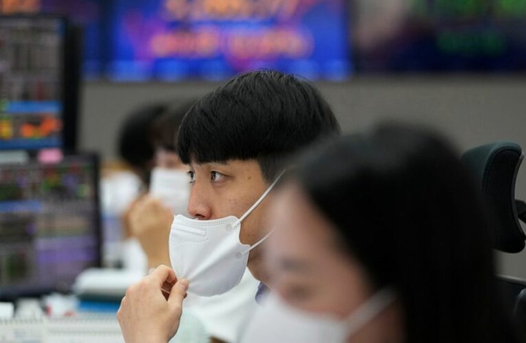 Asia shares mixed as caution prevails ahead of US price data