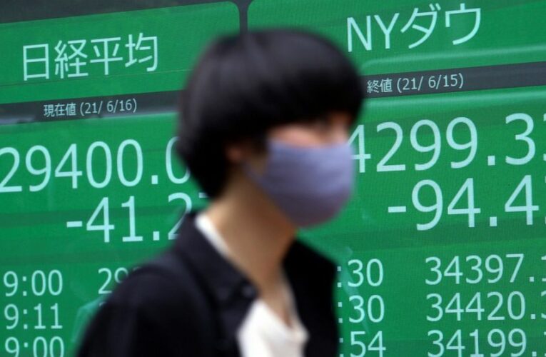 Stocks down, yields up as Fed discusses dialing back support