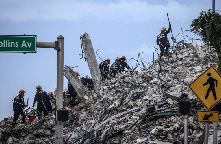 Death toll rises to at least 27 as rescue teams search new areas of debris pile for 118 people who remain unaccounted for