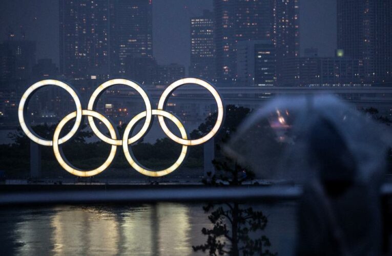 The teenage alternate has no symptoms and is quarantined in her hotel room days before the Olympics