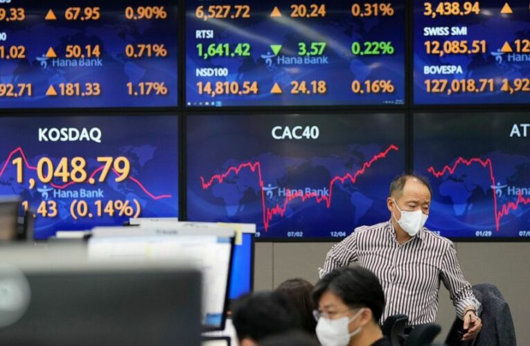 Stocks pull back from record highs as bond yields sink again