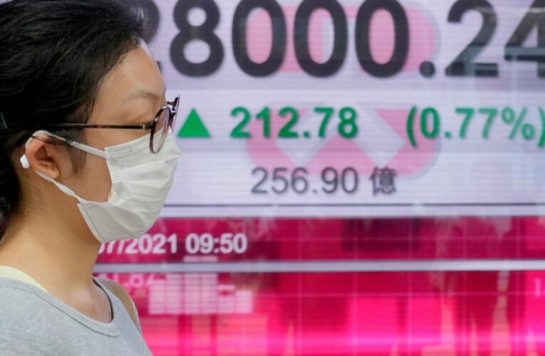 Stocks edge lower, easing indexes below recent record highs