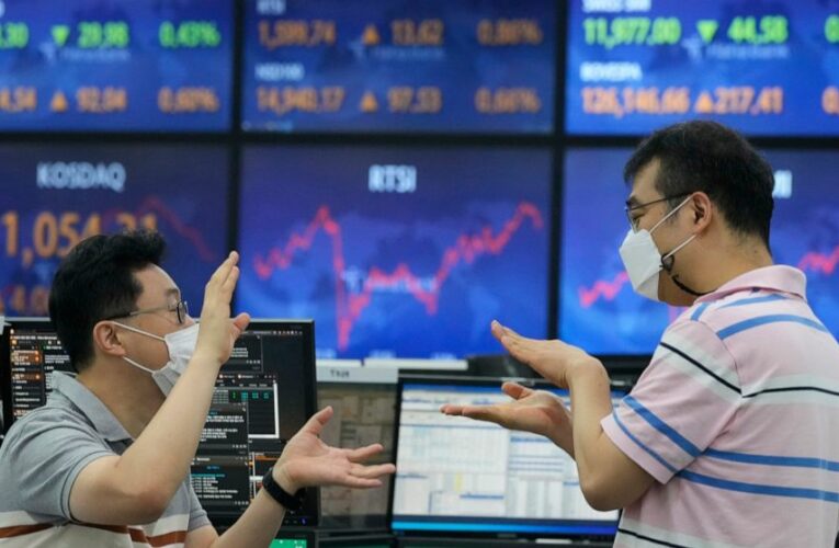 Stocks push higher on Wall Street, on track for weekly gain