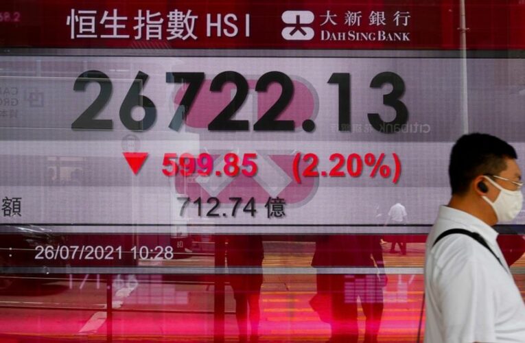 Asian stock markets advance after Wall St rises to record