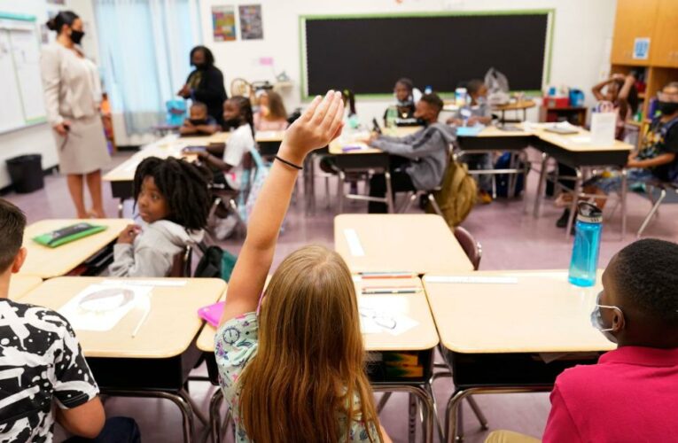 Officials split on masking up children in schools as pediatric hospitals fill up with Covid-19 patients