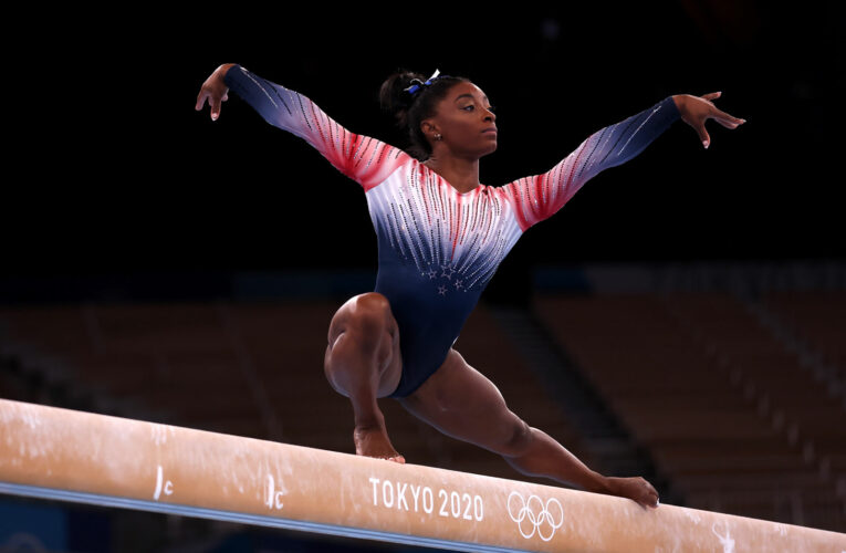 The US gymnast overcame mental health issues to win her seventh Olympic medal. China’s Guan Chenchen took the gold and Tang Xijing the silver.