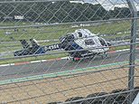 Volunteer marshal dies after being hit by car after it spun off track at Brands Hatch circuit 