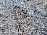Runway at RAF Brize Norton is riddled with POTHOLES