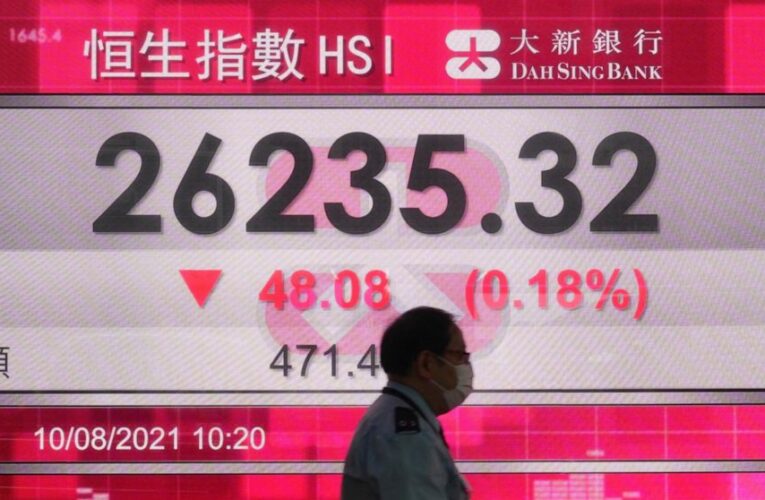 Asian shares mixed as virus fears temper market optimism