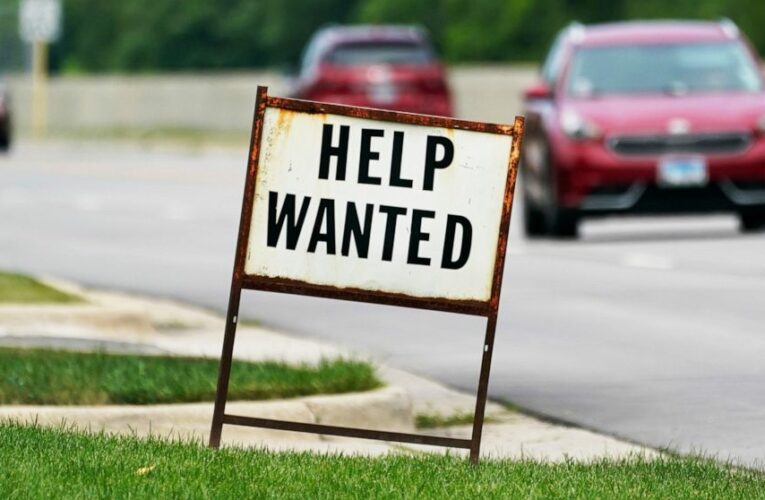 US jobless claims drop by 14,000 to 385,000