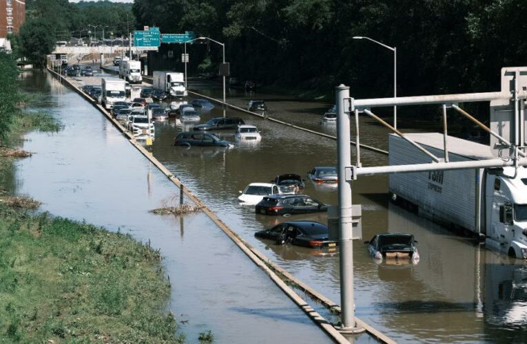 A mother, father and son drowned after more than a dozen feet of rain drenched their apartment