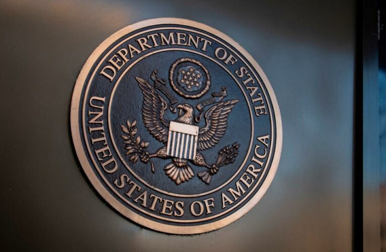 The US citizens left Afghanistan via an overland route to a third country, a State Department official says