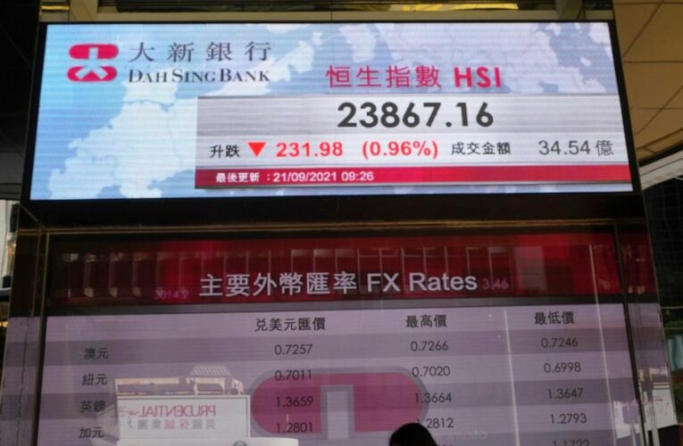 After a wobbly day, major indexes end mixed on Wall Street