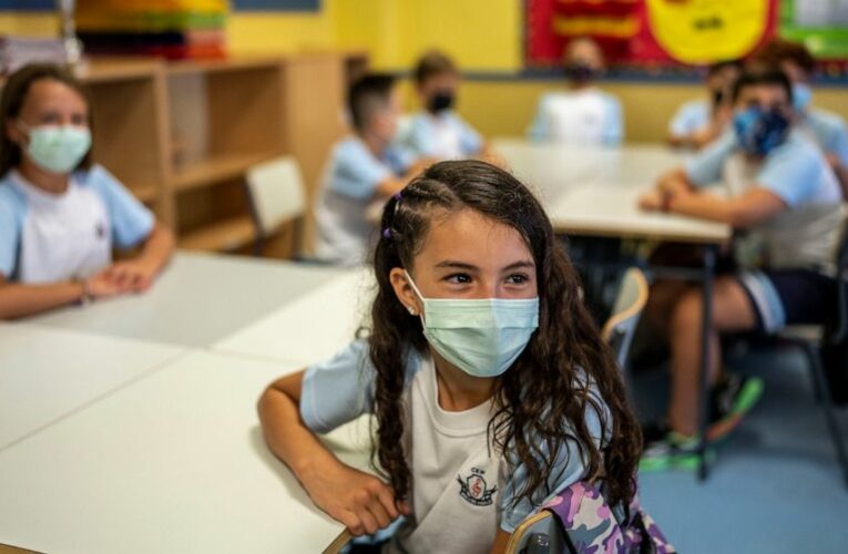 The Latest: Arizona says employee vaccine order is illegal