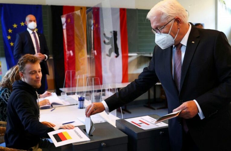 Merkel’s bloc eyes worst result since 1949 but hopes to lead