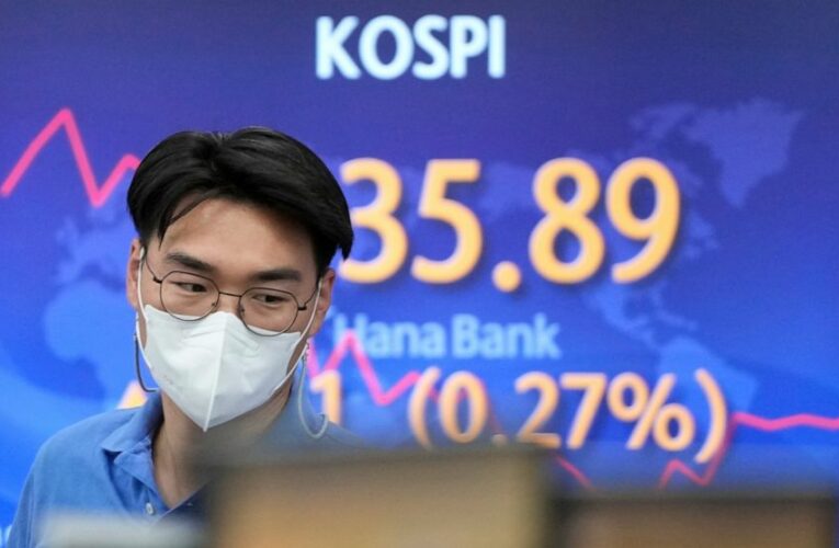 Stocks on Wall Street waver, clinging to gains for the week