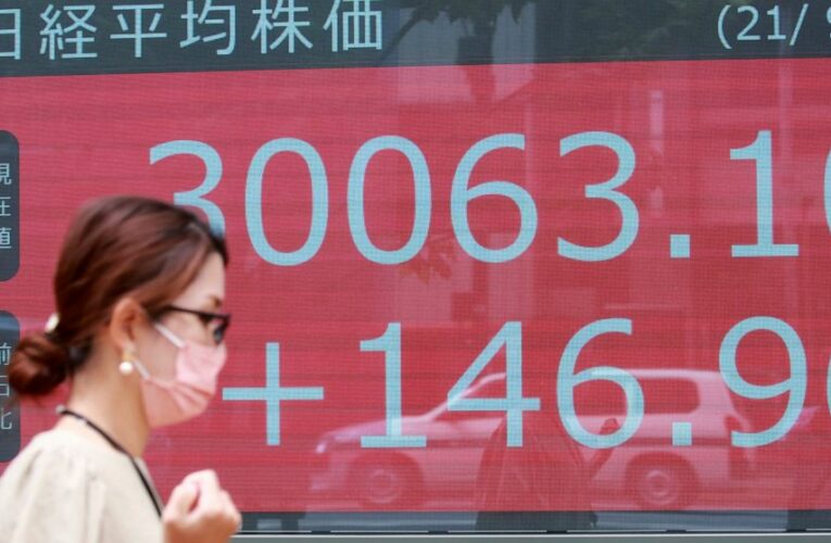 Asian stocks mostly lower after mixed day on Wall Street