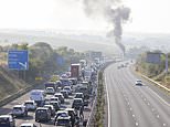 Vehicle fire on M4 causes tailbacks – as giant sinkhole opens up closing two lanes of the M5