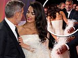 George Clooney cosies up to his wife Amal at The Tender Bar photocall at the London Film Festival