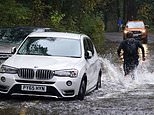 UK weather: Lake District homes and business are left underwater