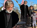 Alec Baldwin is pictured with his family on Northeast coast
