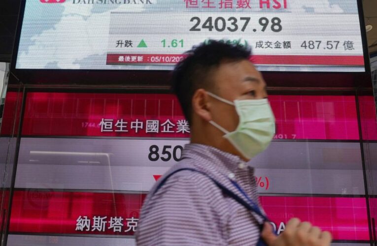 Asian shares slip in cautious trading, shrug off US rally