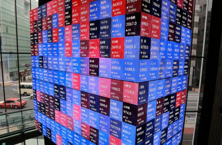 Stocks wobble on Wall Street, easing back from record highs