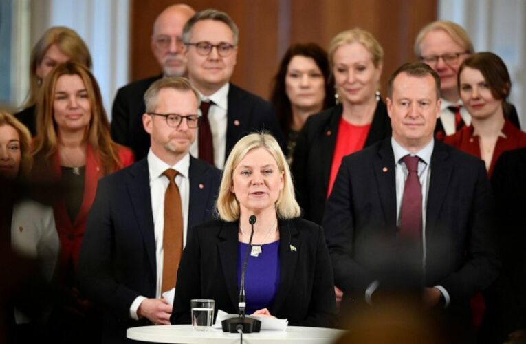 Sweden’s 1st female prime minister names a center-left govt