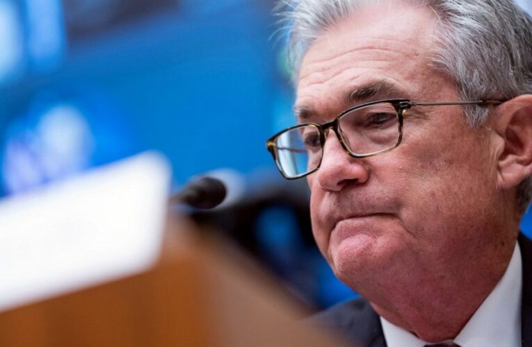 Fed pulls back economic aid in face of rising uncertainties