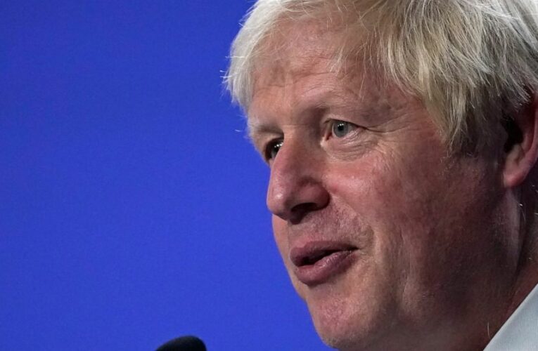 The Latest: Biden hails climate progress, criticizes China