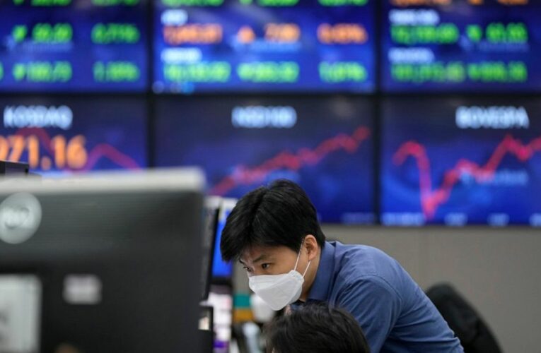 Asian shares mostly rise despite mounting omicron worries