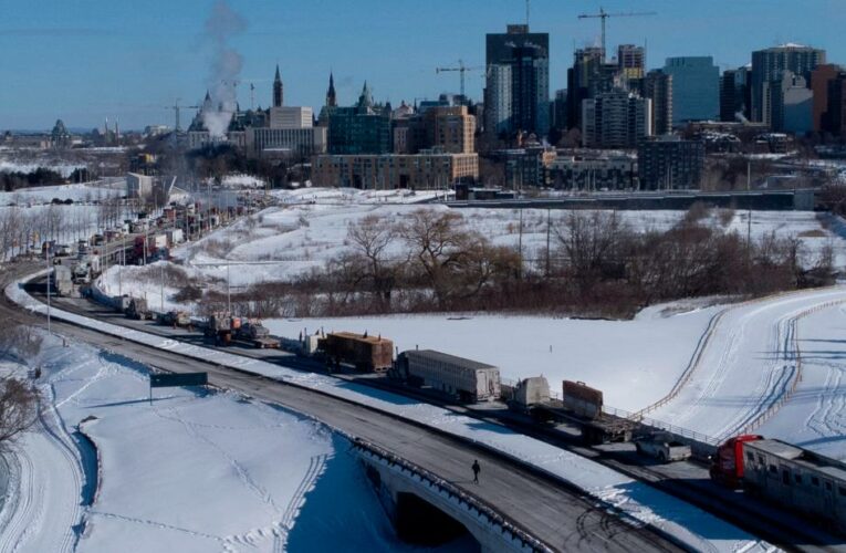 Truckers and protesters against Covid-19 mandates block a border crossing and flood Canada’s capital