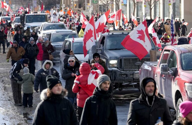 Crowds of demonstrators join rallies across Canada as Covid-19 trucker protests spread