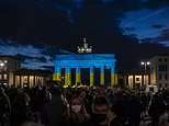 Countries around the world light up buildings in Ukrainian flag colours