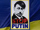 ‘Adolf Putin’ scrawled across Russian buildings as Ukrainian supporters make him look like Hitler