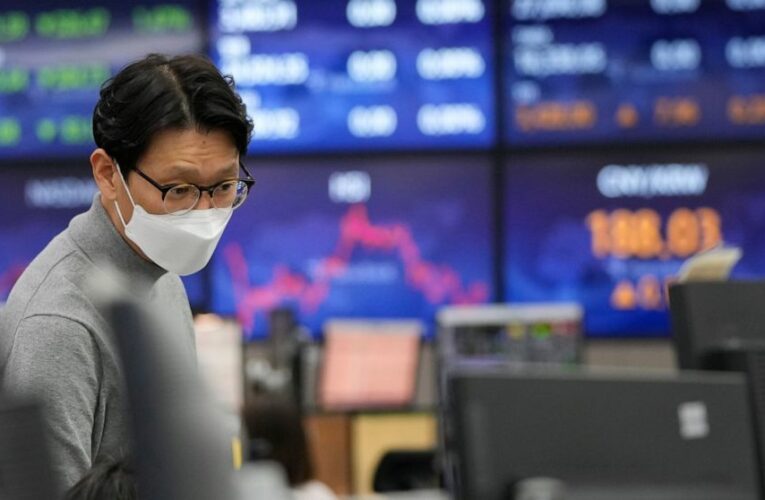 Asian shares skid as hot inflation data point to rate hikes