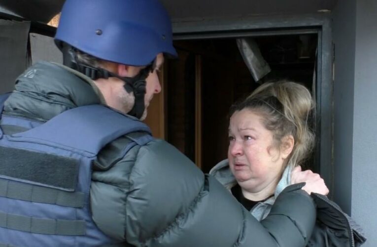 Reporter gets emotional while touring destroyed village