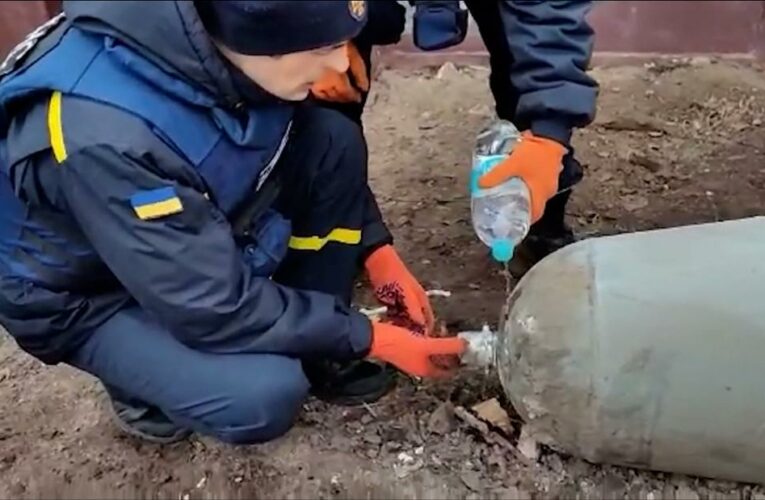 ‘A moment of remarkable cool’: Here’s the moment two Ukrainians defuse a live Russian bomb