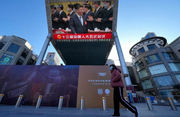 China tries to calm markets by pledging support for economy