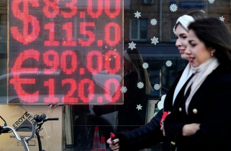 Russian stocks slide as trading resumes for all companies