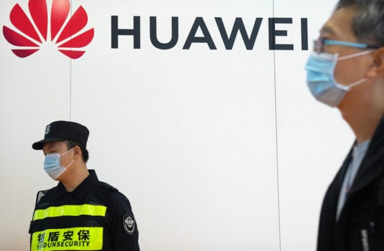 China’s Huawei says 2021 sales down, profit up