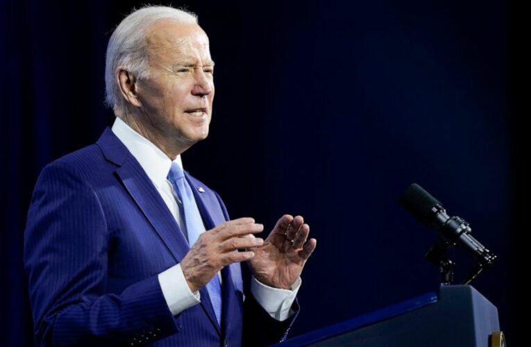 Biden signs budget bill with Ukraine aid but no virus cash