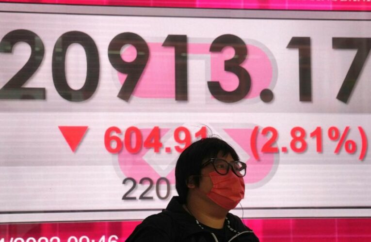 World shares mixed on worries over rate hikes, inflation