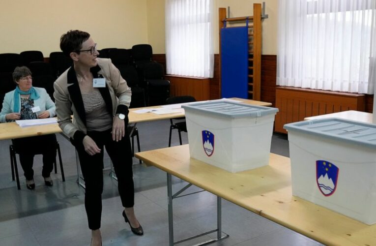 Slovenians vote in tight race between populists, liberals