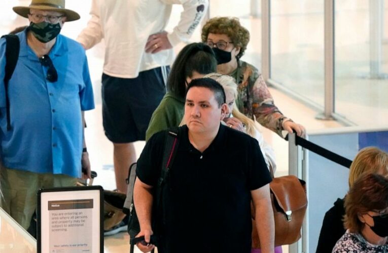Majority of Americans want masks for travelers: AP-NORC poll