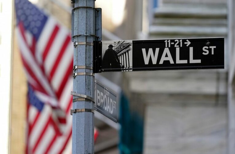 Asian shares mostly lower after tepid gains on Wall Street