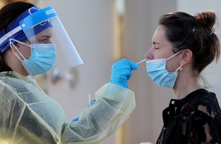 The Biden administration says the US could see 100 million infections later this year, as officials stress the need for more funding to prepare
