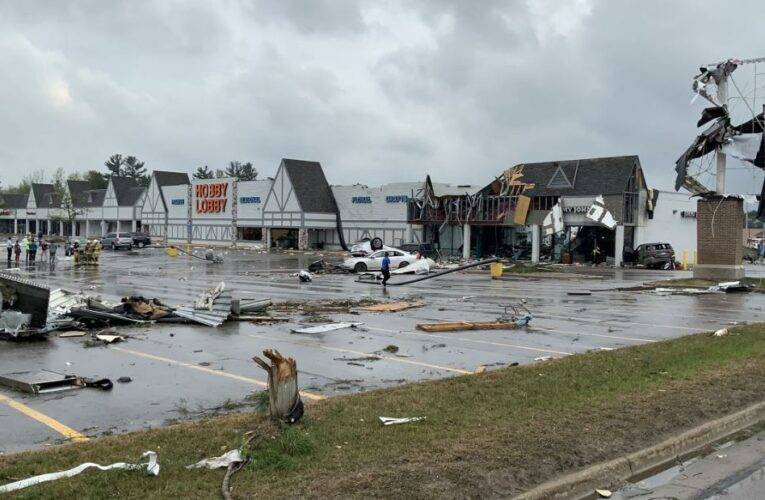 One person is dead and dozens are injured after a tornado went through what an official calls a ‘busy downtown area’