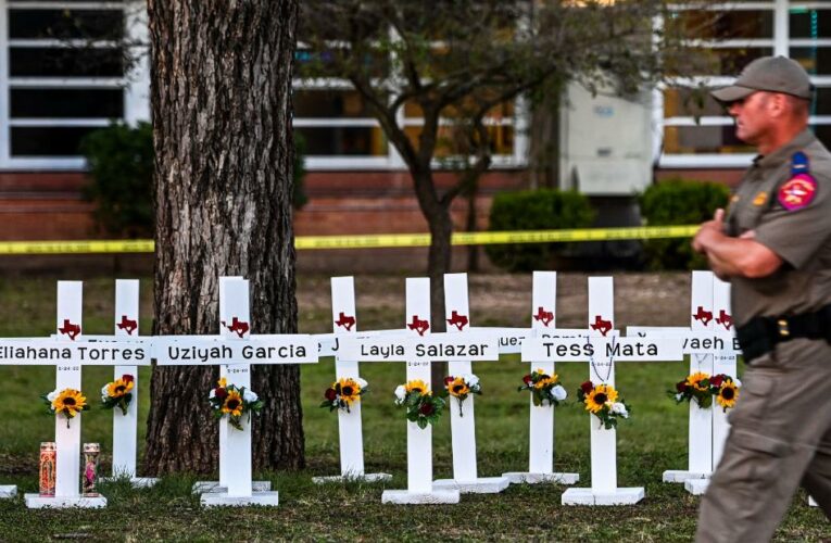 While the shooter was in the school for up to an hour, distraught parents outside clashed with law enforcement officers