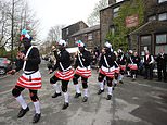 Blackface Morris dancers defy critics to entertain crowd while still wearing controversial make-up 